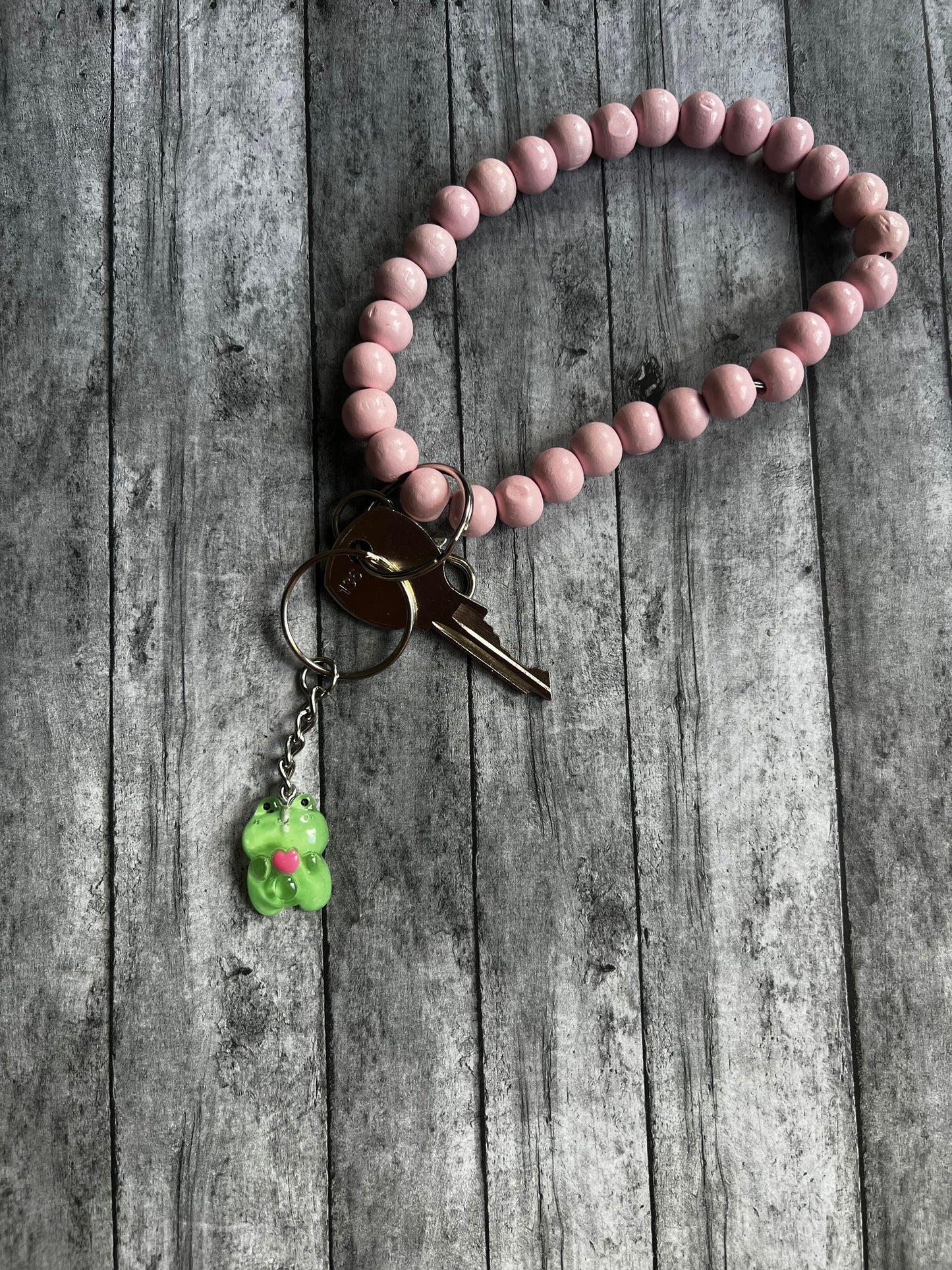 This Keychain is the perfect length to add to any Backpack, Wristlet or etc. The keychain is approximately 3 inches in length.