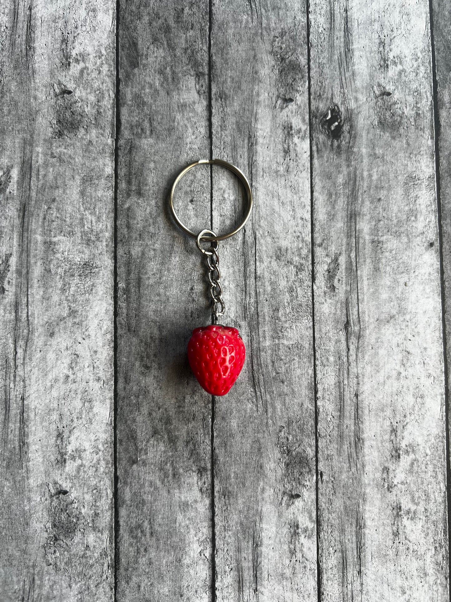 This Vibrant strawberry keychain looks so much like a strawberry. Although it does not smell or taste like one.